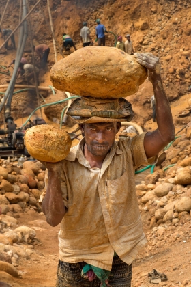 Stone labor carry stone on their overhead