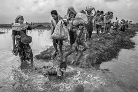 Thousands of Rohingyas crossing the border between Myanmar and Bangladesh after the Burmese army started an operation against the Rohingyas, by burning and destroying their home in the Rakhine state of Myanmar. According to UNHCR, more than 723,000 refugees have fled to Bangladesh from Myanmar.