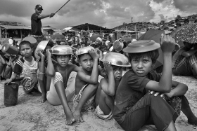Hundreds Rohingya childrens are waiting for food near Thankkhali Refugees camp.