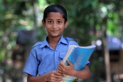 Smiling face of Shakib son of successful farmer Abu Hanif is going to school in Khulna, Bangladesh. Photo by M. Yousuf Tushar. April 17, 2014